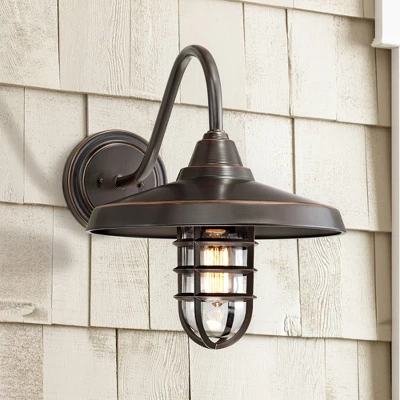 John Timberland Marlowe Rustic Industrial Farmhouse Outdoor Wall Light Fixture Painted Bronze Cage 16 3/4" Clear Glass For Post Exterior Barn Deck 1 John Timberland Marlowe Rustic Industrial Farmhouse Outdoor Wall Light Fixture Painted Bronze Cage 16 3/4" Clear Glass For Post Exterior Barn Deck